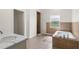 Luxurious bathroom featuring double vanity, shower and bathtub at 5820 E Johnson Ave, Haines City, FL 33844