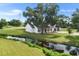 Exterior shot of the home with a creek running through the front yard at 5820 E Johnson Ave, Haines City, FL 33844