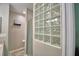 The bathroom features neutral colors, a walk-in shower, and stylish finishes at 6028 Hillside Heights Dr, Lakeland, FL 33812