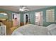 This bedroom is bright and features walk in closet and en suite bathroom at 6028 Hillside Heights Dr, Lakeland, FL 33812