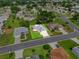 Charming single-story home with a well-manicured lawn and mature trees in a quiet neighborhood at 6192 Magpie Dr, Lakeland, FL 33809