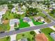 Aerial view of a residential neighborhood with well-manicured lawns and mature trees at 6192 Magpie Dr, Lakeland, FL 33809