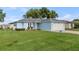 Charming single-story home with a well-manicured lawn and a two-car garage in a peaceful neighborhood at 6192 Magpie Dr, Lakeland, FL 33809
