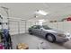 Spacious two-car garage with ample storage space and clean epoxy flooring at 6192 Magpie Dr, Lakeland, FL 33809
