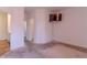 Bedroom featuring neutral carpet and a TV at 6300 Dolostone Dr, Lakeland, FL 33811