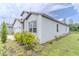 Side exterior showing clean lines, tidy landscaping, and a well-maintained lawn, boosting curb appeal at 6300 Dolostone Dr, Lakeland, FL 33811