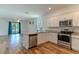 Modern kitchen with stainless steel appliances and granite countertops at 6300 Dolostone Dr, Lakeland, FL 33811