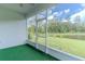 A screened porch with views of the water at 6300 Dolostone Dr, Lakeland, FL 33811