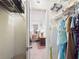 Walk-in closet providing extra storage and space for clothes and accessories at 700 Mirror Nw Ter # 702, Winter Haven, FL 33881