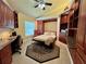 Bedroom featuring a Murphy bed, overhead lighting, and custom built-in cabinets at 741 Canberra Rd, Winter Haven, FL 33884