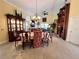 Open-concept dining room showcasing elegant decor and easy access to the living area at 741 Canberra Rd, Winter Haven, FL 33884