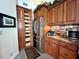 Spacious kitchen with built-in pantry, stainless steel appliances, and abundant cabinet space at 741 Canberra Rd, Winter Haven, FL 33884