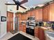 Bright kitchen with stainless steel appliances, ample cabinet space, and granite countertops at 741 Canberra Rd, Winter Haven, FL 33884
