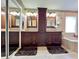 Elegant main bathroom features dual sinks, granite countertops, and a soaking tub at 741 Canberra Rd, Winter Haven, FL 33884