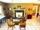 Inviting living room featuring a decorative fireplace and tile flooring, creating a cozy and stylish atmosphere at 8110 Walt Williams Rd, Lakeland, FL 33809