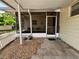 Cozy covered patio with furniture offers a perfect space for outdoor entertaining at 816 Casselberry Dr, Lake Wales, FL 33853