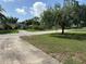 Neighborhood street view with well-maintained lawns and houses at 816 Casselberry Dr, Lake Wales, FL 33853