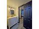 Tastefully renovated bathroom with modern vanity, fixtures, and decor at 816 Pinewood Ct # 3126, Haines City, FL 33844