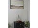 Bedroom showcasing a black bedside table with decor and a framed painting at 816 Pinewood Ct # 3126, Haines City, FL 33844