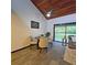 Cozy dining area features wood ceiling, ceiling fan, and sliding glass doors to an outdoor patio at 816 Pinewood Ct # 3126, Haines City, FL 33844