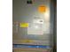 Close-up of the HVAC unit with detailed specifications and labels at 816 Pinewood Ct # 3126, Haines City, FL 33844