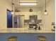 The modernized kitchen showcases stainless steel appliances and bar seating at 816 Pinewood Ct # 3126, Haines City, FL 33844