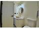 Renovated bathroom featuring stylish decor, a stone vessel sink and modern fixtures at 10708 Belo Horizonte Ave, Clermont, FL 34711