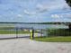 Gated lake access offers peaceful views and recreational opportunities at 10708 Belo Horizonte Ave, Clermont, FL 34711