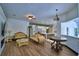 Open concept living room that includes access to the kitchen at 10708 Belo Horizonte Ave, Clermont, FL 34711