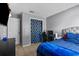Comfortable bedroom with neutral paint and tile flooring at 1100 Lowry Ave # 63, Lakeland, FL 33801