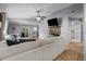 The living room has tile flooring and a ceiling fan at 1100 Lowry Ave # 63, Lakeland, FL 33801