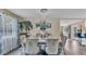 Dining room featuring hardwood floors, contemporary furnishings and a chandelier at 1125 Rolling Woods Ln, Lakeland, FL 33813