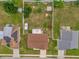 A home features a fenced backyard, shed, and well-maintained landscaping at 1366 Merrimack Pl, Davenport, FL 33837