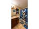 Bathroom with butterfly shower curtain and matching décor at 1366 Merrimack Pl, Davenport, FL 33837