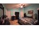 Bedroom with tiled floors, ceiling fan, and desk at 1366 Merrimack Pl, Davenport, FL 33837