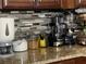 Countertop displaying storage containers and small appliances at 1366 Merrimack Pl, Davenport, FL 33837