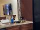 Well-maintained kitchen sink with granite countertops and dark cabinetry at 1366 Merrimack Pl, Davenport, FL 33837