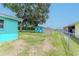 The house's backyard features a shed and a small casita at 2125 Hillcrest Rd, Auburndale, FL 33823