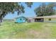 The house's backyard features a shed and a casita at 2125 Hillcrest Rd, Auburndale, FL 33823