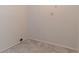 Laundry room with vinyl floor and walls painted in a light color at 2125 Hillcrest Rd, Auburndale, FL 33823