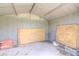 This is the interior of a shed, where two plywood sheets are placed on the floor at 2125 Hillcrest Rd, Auburndale, FL 33823