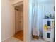 Utility room with water heater and vinyl floor at 2125 Hillcrest Rd, Auburndale, FL 33823
