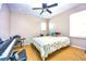 Simple bedroom with a window, ceiling fan, and carpet at 2169 Rose Blvd, Winter Haven, FL 33881