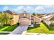 Charming single-Gathering home with a two-car garage, green lawn, and well-manicured landscape at 2169 Rose Blvd, Winter Haven, FL 33881
