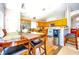Eat in kitchen with stainless steel appliances, wooden cabinets, and breakfast bar at 2169 Rose Blvd, Winter Haven, FL 33881