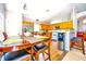 Eat in kitchen with stainless steel appliances, wooden cabinets, and breakfast bar at 2169 Rose Blvd, Winter Haven, FL 33881