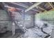 Unfinished basement features block walls, wood stairs, and a small window offering natural light at 2218 Melbourne Ave, Haines City, FL 33844