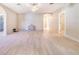 Spacious living room with beautiful flooring, modern lighting and a nice archway detail at 2218 Melbourne Ave, Haines City, FL 33844