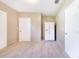 Bright room boasts modern tile flooring and multiple doors for easy access and convenience at 2218 Melbourne Ave, Haines City, FL 33844
