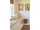 Cozy window seat with patterned cushions and storage drawers at 2300 Scenic N Hwy # 51, Lake Wales, FL 33898